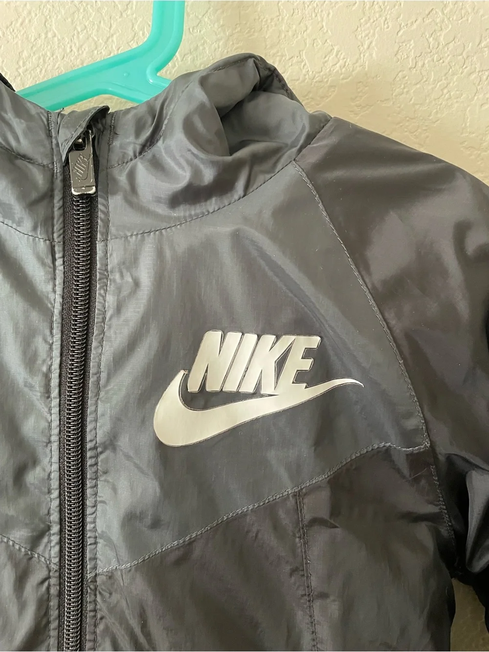 Nike Kids Black Raincoat with White Logo